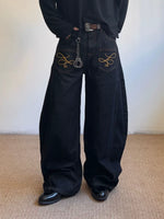 Curved Blade Embroidered Wide-Leg Jeans 1