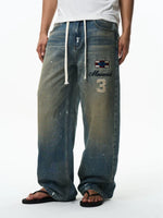 Embroidered Loose Fit Drawstring Denim Pants 3