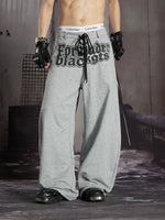 Printed Wide-Leg Ripped Sweatpants 1